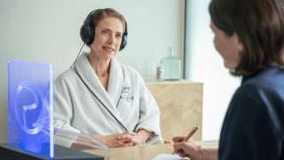 femme avec casque pour séance physioscan